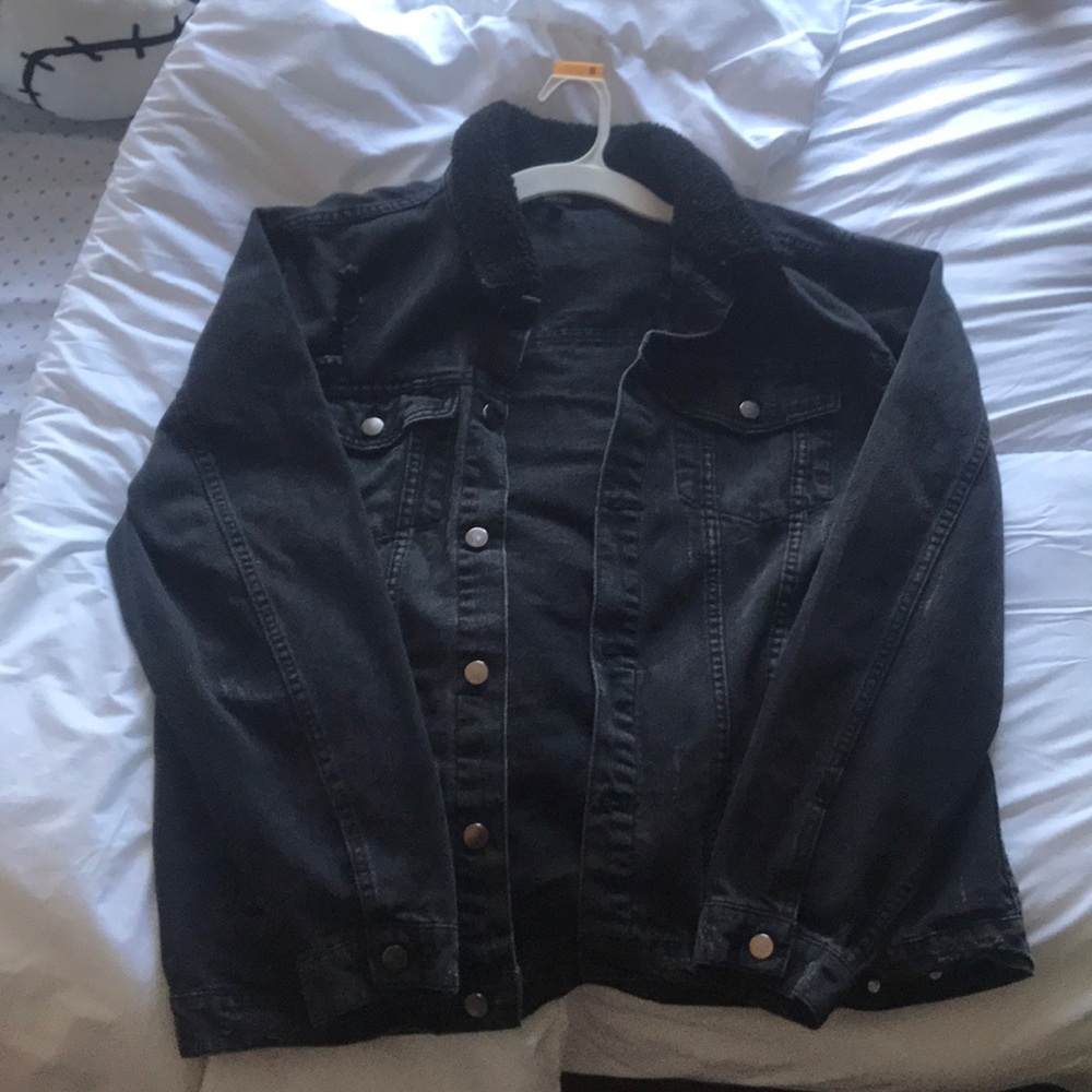 Black jean jacket with fur inside with rips